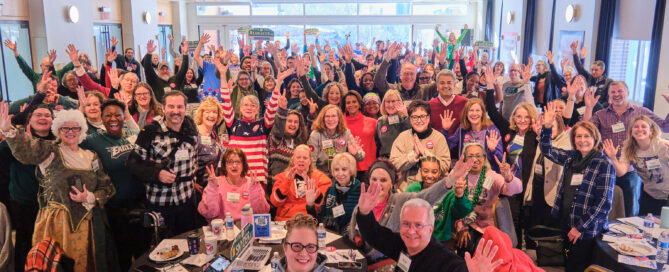Group of participants from the January 2026 Pham Camp posing for a photo with guest speaker, Tamala Edwards.
